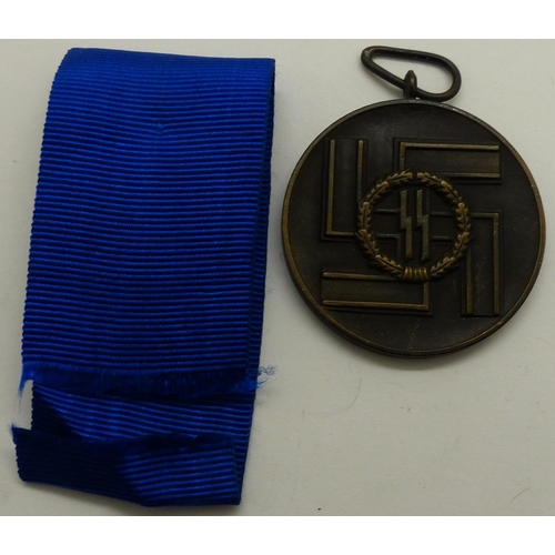 2180K - German SS bronze grade 8 Years Service medal. P&P Group 1 (£14+VAT for the first lot and £1+VAT for ... 