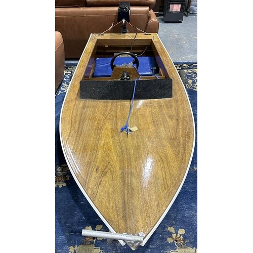 2183E - Hand built single seat motor boat, with battery powered four-gear outboard. centre-console command w... 