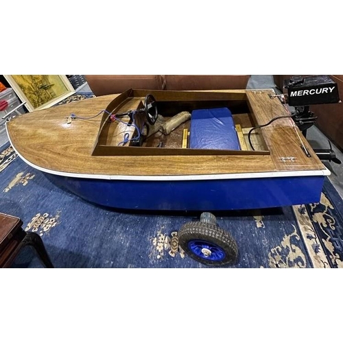 2183E - Hand built single seat motor boat, with battery powered four-gear outboard. centre-console command w... 