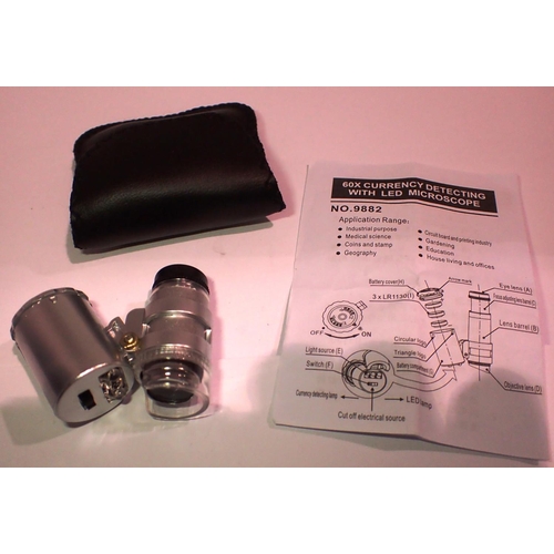 1087 - 60x currency/jewellery loupe with LED microscope in pouch, with instructions. P&P Group 1 (£14+VAT f... 