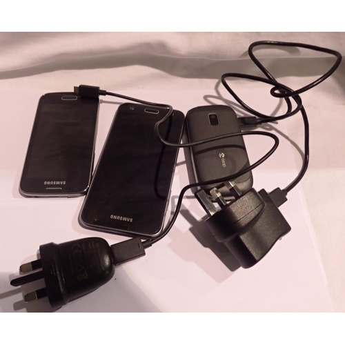 1091 - Three mobile phones, two Samsung and another, with power supplies. P&P Group 1 (£14+VAT for the firs... 