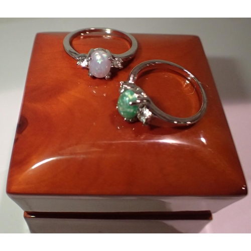 1146 - Two stone set presumed silver rings, sizes S and U, combined 5g. P&P Group 1 (£14+VAT for the first ... 