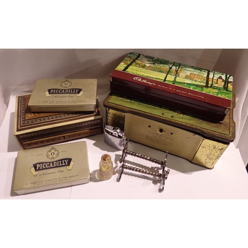 1162 - Mixed items to include collectable tins and a knife rest. Not available for in-house P&P