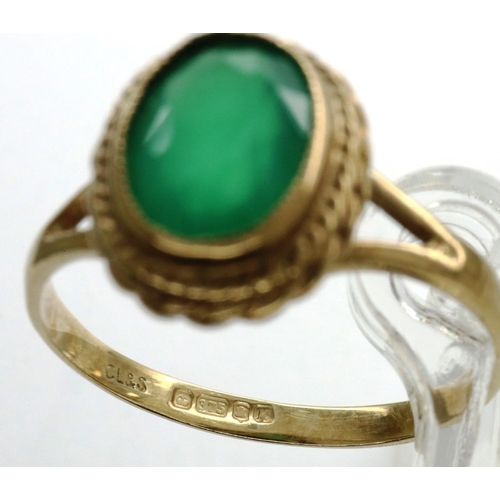 34 - 9ct gold ring set with a singular jadeite, size Q, 2.2g. P&P Group 1 (£14+VAT for the first lot and ... 