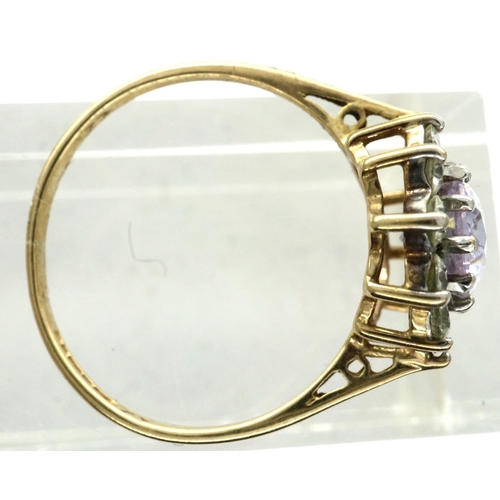 38 - 9ct gold daisy ring set with amethyst and CZ, size P, 2.2g. P&P Group 1 (£14+VAT for the first lot a... 