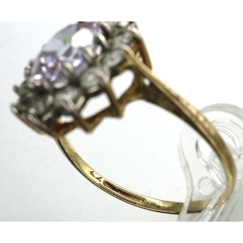 38 - 9ct gold daisy ring set with amethyst and CZ, size P, 2.2g. P&P Group 1 (£14+VAT for the first lot a... 