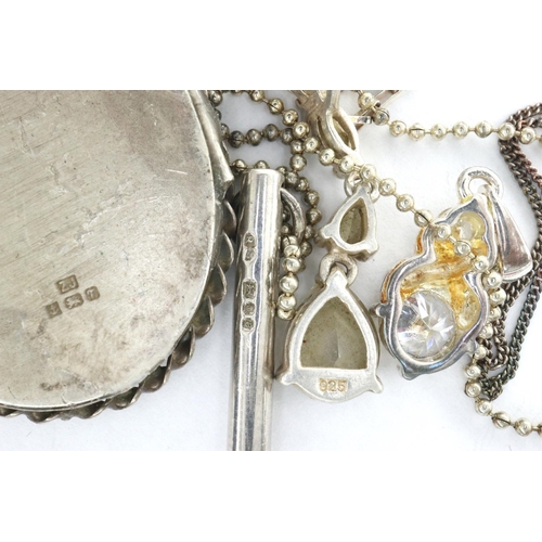 43 - Six silver pendant necklaces including a hallmarked silver locket, longest chain L: 60 cm. P&P Group... 