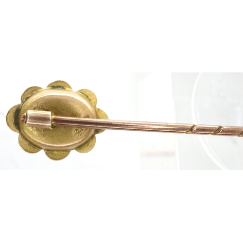 47 - 9ct gold pin brooch set with a central ruby, L: 50 mm, 0.68g. P&P Group 1 (£14+VAT for the first lot... 