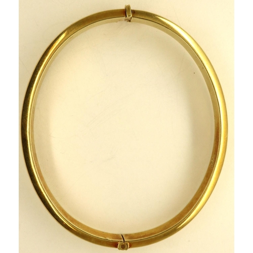 60 - 14ct gold snap bangle, 14.9g. P&P Group 1 (£14+VAT for the first lot and £1+VAT for subsequent lots)