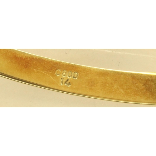 60 - 14ct gold snap bangle, 14.9g. P&P Group 1 (£14+VAT for the first lot and £1+VAT for subsequent lots)