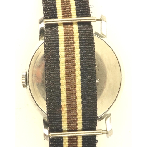 68 - 1970s Timex Mickey Mouse mechanical wristwatch on a canvas strap, working at lotting. P&P Group 1 (£... 