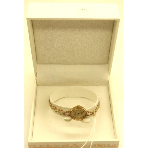 73 - Geneve: 9ct gold ladies wristwatch on a 9ct gold bracelet, 6.9g, not working at lotting. P&P Group 1... 