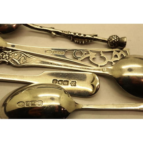 112 - Eight mixed hallmarked silver spoons including a tea strainer, combined 133g. P&P Group 1 (£14+VAT f... 