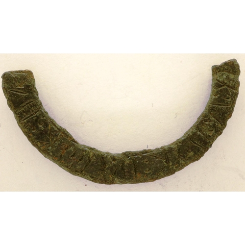 127 - Saxon bronze half ring talisman, not translated, L: 40 mm. P&P Group 0 (£5+VAT for the first lot and... 