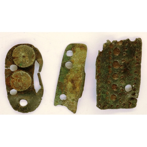 137 - Roman Bronze Age remnants of centurion scale armour, L: 22 mm. P&P Group 0 (£5+VAT for the first lot... 