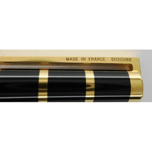 169 - Dupont of Paris gold plated and black lacquer ballpoint pen, boxed with papers and refill. P&P Group... 