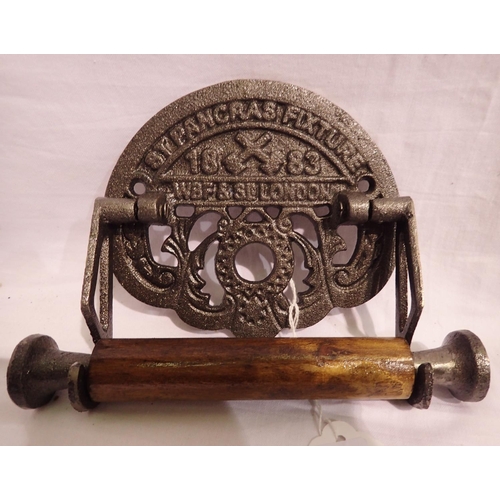 1215 - Cast iron St Pancreas toilet roll holder, W: 18 cm. P&P Group 1 (£14+VAT for the first lot and £1+VA... 