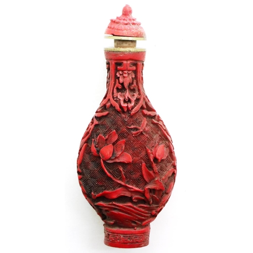 295 - Carved Chinese cinnabar snuff bottle, H: 80 mm, no damages. P&P Group 1 (£14+VAT for the first lot a... 