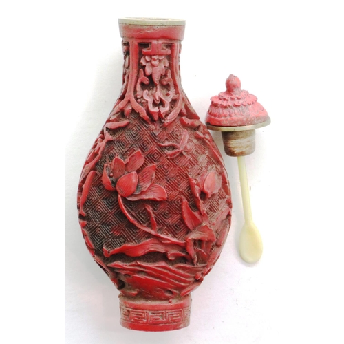 295 - Carved Chinese cinnabar snuff bottle, H: 80 mm, no damages. P&P Group 1 (£14+VAT for the first lot a... 