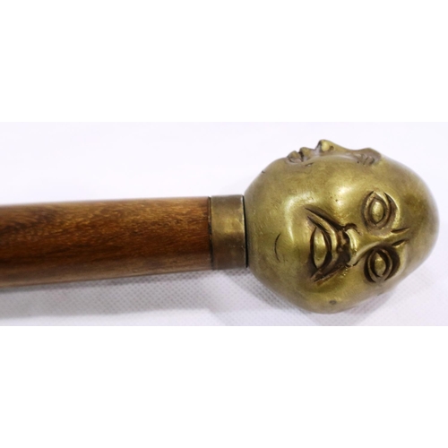 302 - Brass four faced Buddha handled walking stick, L: 94 cm. P&P Group 3 (£25+VAT for the first lot and ... 