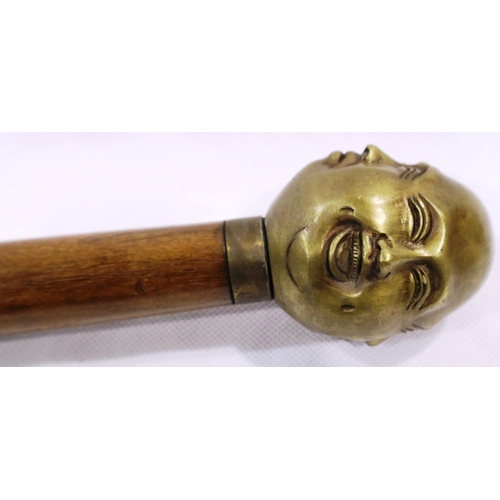 302 - Brass four faced Buddha handled walking stick, L: 94 cm. P&P Group 3 (£25+VAT for the first lot and ... 