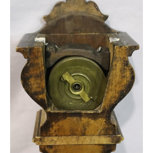 341 - Unusual shaped walnut cased mantle clock with brass detailing in relief, not working at lotting, H: ... 