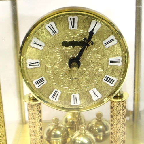 342 - Schatz quartz gilt cased anniversary clock, working at lotting, H: 24 cm. P&P Group 2 (£18+VAT for t... 