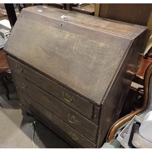 1535 - Victorian oak three drawer bureau with fitted interior. Not available for in-house P&P