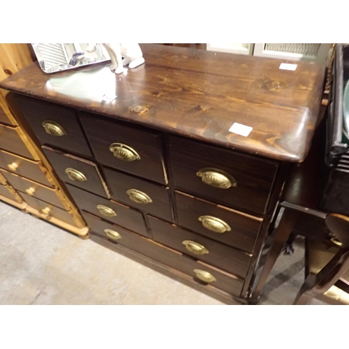 1580 - Stained pine chest of nine drawers, 84 x 38 x 89 cm H. Not available for in-house P&P