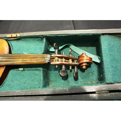 401 - A 19th century violin bearing no makers label, with bow and ebonised fitted case, violin L: 60 cm. P... 