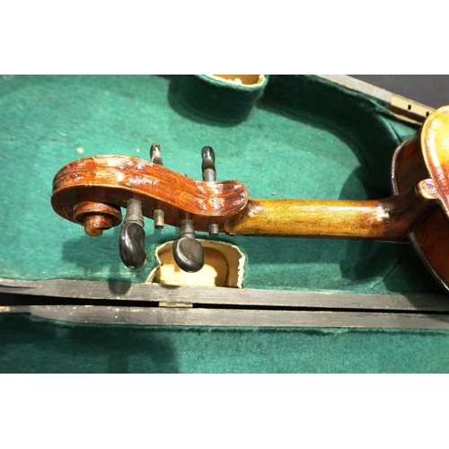 401 - A 19th century violin bearing no makers label, with bow and ebonised fitted case, violin L: 60 cm. P... 