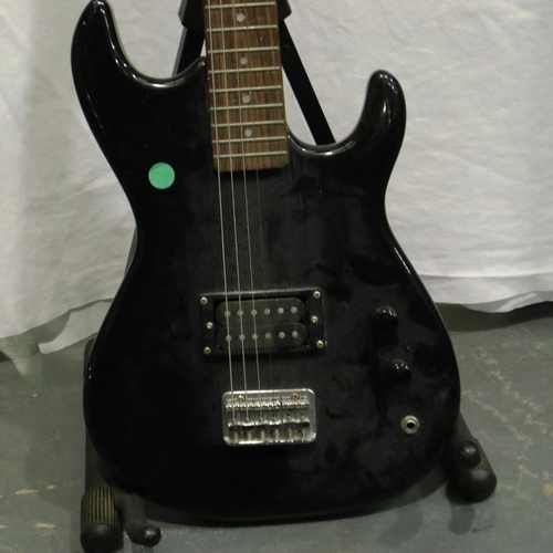 403 - Encore black electric guitar. P&P Group 3 (£25+VAT for the first lot and £5+VAT for subsequent lots)