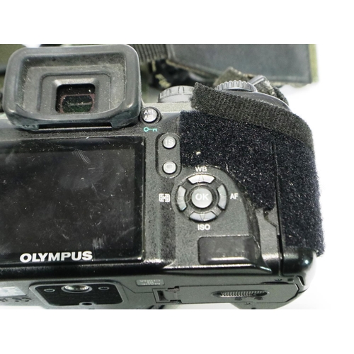 385 - Olympus E510 digital camera with accessories and an Olympus digital, 40-150mm, 1:4-5.6 ED lens. Not ... 