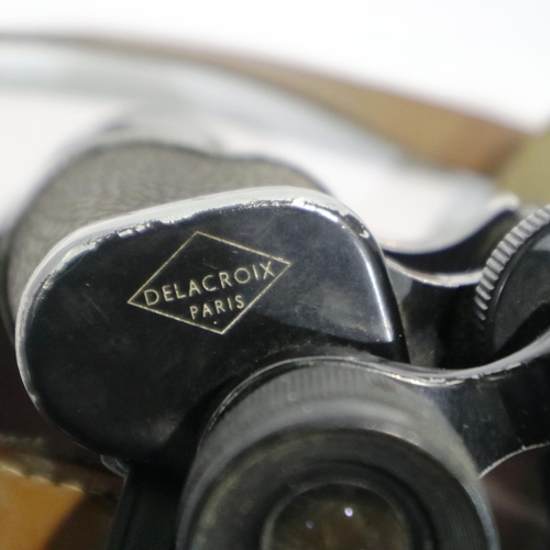 386 - Delacroix of Paris, 10 x 35 binoculars with leather case. P&P Group 1 (£14+VAT for the first lot and... 