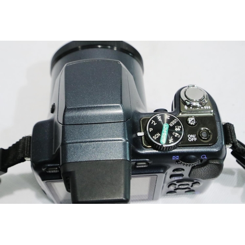 387 - Pentax HDMI camera with 26x optical zoom lens with accessories. P&P Group 2 (£18+VAT for the first l... 