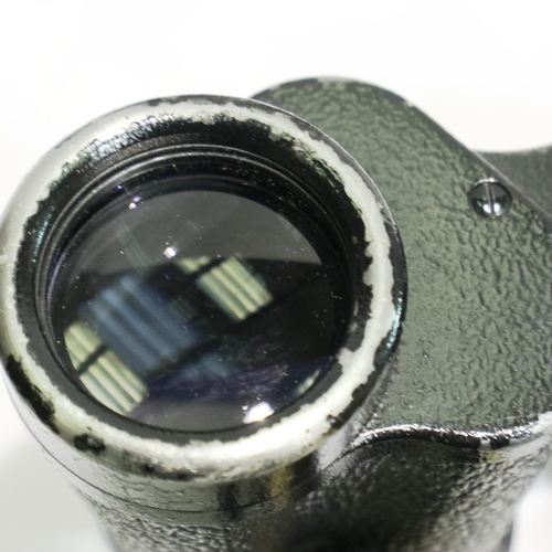 390 - Carl Zeiss Jenoptem 8 x 30 binoculars with leather case. P&P Group 1 (£14+VAT for the first lot and ... 