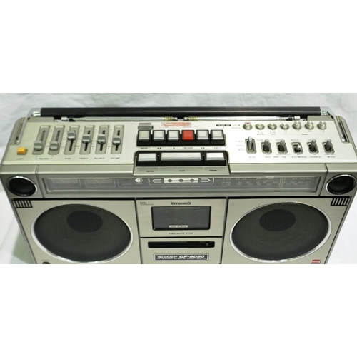 398 - Sharp GF-9090E radio cassette in original gold retail box, good cosmetic condition. All electrical i... 