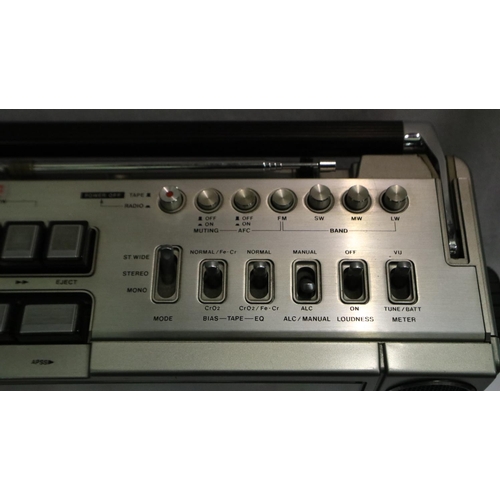 398 - Sharp GF-9090E radio cassette in original gold retail box, good cosmetic condition. All electrical i... 