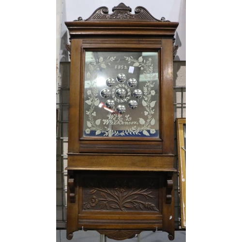 2045 - A Victorian walnut framed hall mirror, the glass etched, dated 1892 and named to WEL Wilkinson, over... 