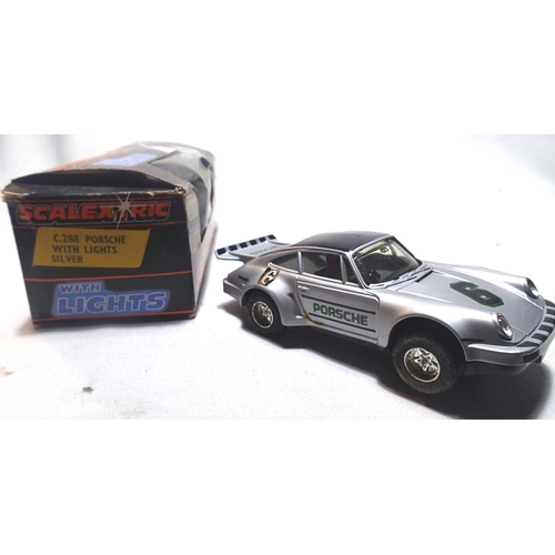 2012 - Two Scalextric cars with lights, C287 Ford Escort, brown, Westwood Racing, and C288 Porsche, silver,... 