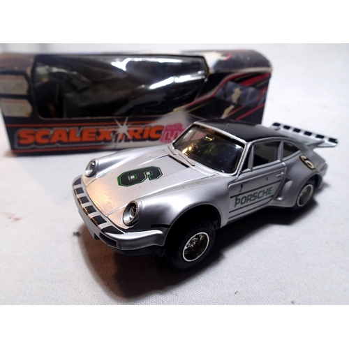 2012 - Two Scalextric cars with lights, C287 Ford Escort, brown, Westwood Racing, and C288 Porsche, silver,... 