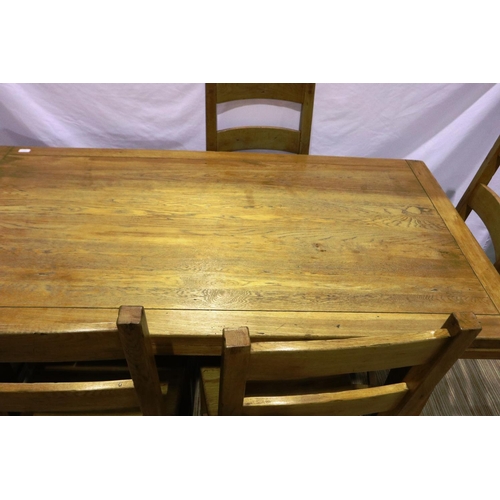 2095 - A substantial country oak draw-leaf dining table with a set of five ladderback chairs, table 260 x 9... 