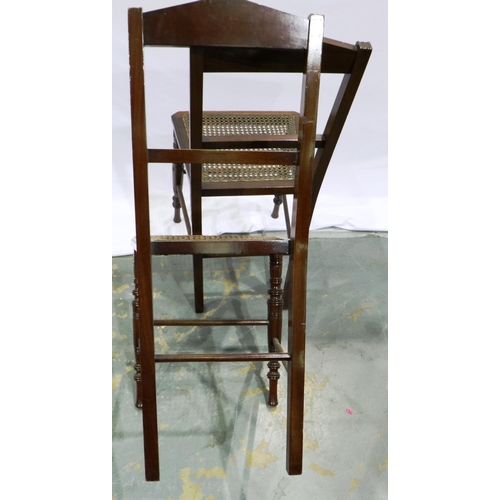 2109 - Pair of early 20th century mahogany bedroom chairs, each with bergere seats and turned supports. Not... 