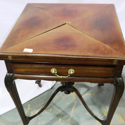 2111 - A Victorian mahogany card table with envelope fold action, single drawer and carved supports, 79 x 7... 