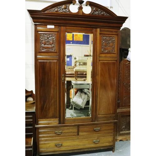 2113 - An Edwardian walnut two piece bedroom suite, comprising a single door mirrored wardrobe and a dresse... 