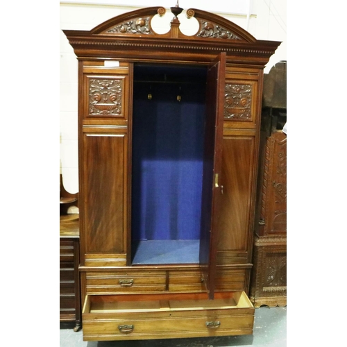 2113 - An Edwardian walnut two piece bedroom suite, comprising a single door mirrored wardrobe and a dresse... 