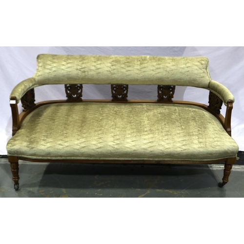 2117 - An Edwardian walnut framed two-seat settee, with carved and later upholstered back-rest and overstuf... 