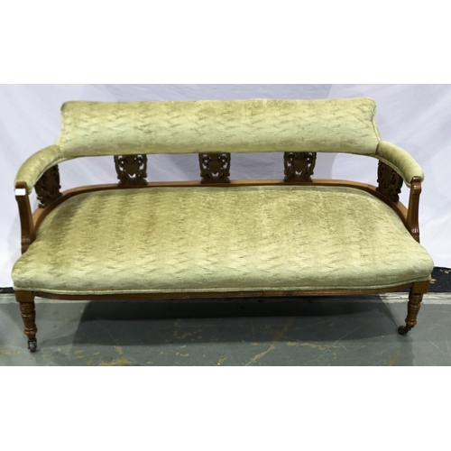 2117 - An Edwardian walnut framed two-seat settee, with carved and later upholstered back-rest and overstuf... 