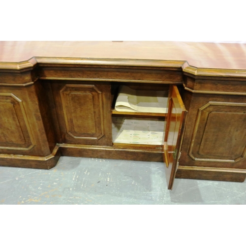 2118 - 19th century walnut sideboard, with inverted break-front, having four panelled doors and cellarette ... 