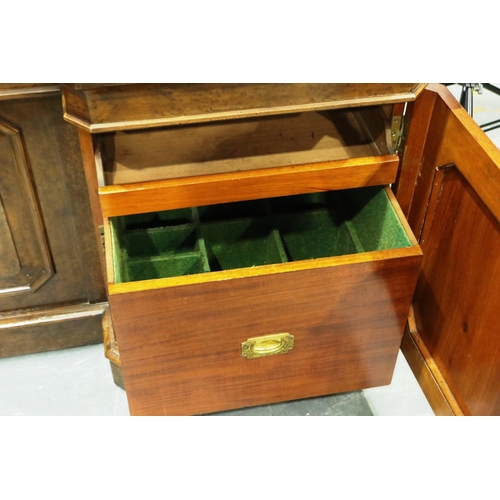 2118 - 19th century walnut sideboard, with inverted break-front, having four panelled doors and cellarette ... 